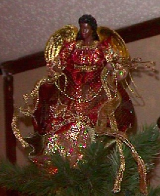 Angel high on Christmas Tree