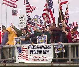 you guessed it, more people, flags and signs