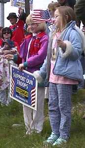 two older children with sign