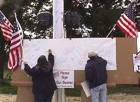 signing banner